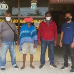 Tersangka Roi (2 dari kiri) diamankan di Mapolsek Tanjung Beringin,Minggu (12/12/2021)