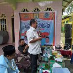Bupati Sergai Darma Wijaya didampingi Ketua BKPRMI Andi Ginting memberikan sambutan dalam Gebyar Vaksinasi di Jati Mulyo,Sabtu (11/12/2021)