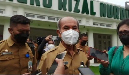 Larso Marbun saat dikonfirmasi wartawan