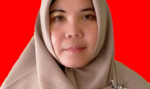 Kepala  MAN 1 Palas Plus Keterampilan dan Riset,Hj Mahyarni Junida Nasution.S.Pd.MA.  