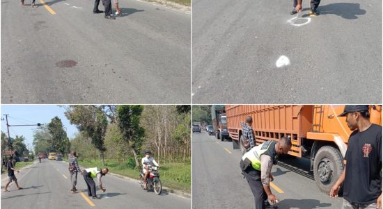Petugas dari Unit Laka Pos Lantas Sei Bamban melakukan olah TKP ditempat kejadian kecelakaan.