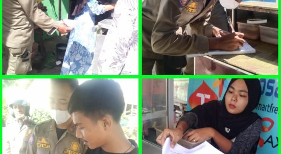 Personil Satpol PP Sergai menyerahkan surat teguran ketiga kepada para pedagang yang berjualan disekitar jalan lintas Galang-Tebingtinggi tepatnya di Pekan Dolok Masihul.