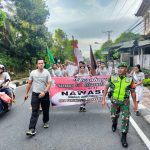 2. Babinsa Semarapura Lepas Peserta Jalan Sehat1673830368598